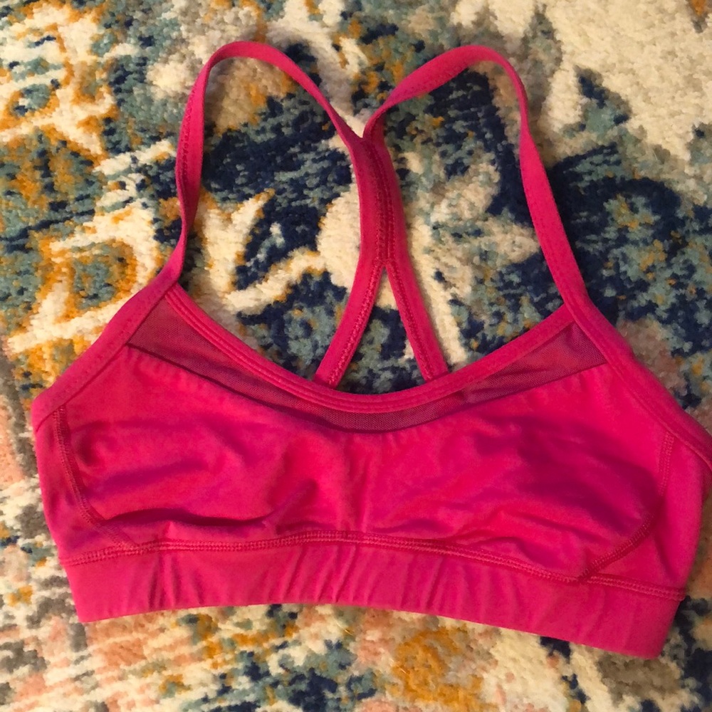 Hot pink Lululemon sports bra